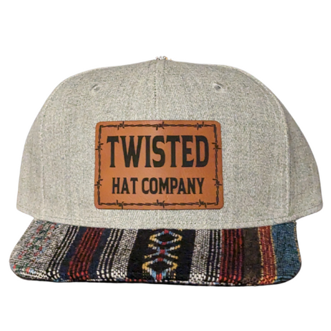 Full quill heather gray hat with saddle blanket printed bill woth a learther barbwire patch 