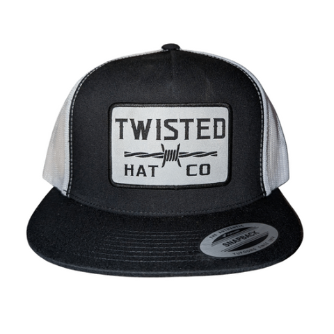 Black and white yupoong 6006 snapback woth barbwire logo on woven patch 
